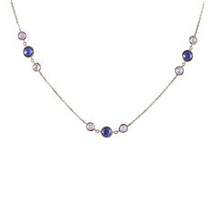 This is part of Chairish’s Fine Jewelry assortment.  Estate Italian blue & white sapphire 18K necklace. This estate necklace is crafted in 18 karat yellow gold featuring bezel set blue sapphires at 3.0 carat total weight and another 3.0 carat total weight of bezel set white sapphires. [KIMH 586]  Dimensions 16-18"L (adjustable)  Metal: 18k Gold,Yellow Gold Stone: Blue Sapphire Stone Cut: Round Cut  Please reference the measurements noted in the description above for the best approximate dimensio Luxury Tanzanite Gold Necklaces, Luxury Blue Tanzanite Necklace, Elegant Gold Tanzanite Necklace, Formal Blue Multi-stone Necklaces, Blue Multi-stone Necklaces For Formal Occasions, Luxury Blue Multi-stone Necklace, Luxury Blue Multi-stone Necklaces, Elegant Blue Tanzanite Necklace, Elegant Sapphire Multi-stone Necklace