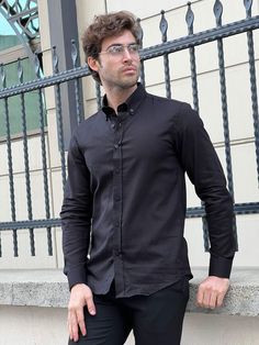 We're Featuring a Special Production of high-quality slim-fit Cotton Black Shirt From HolloMen Spring Summer New Collection. Shirt Color: Black. Shirts Fabric includes 100% Cotton. Product Details: Cotton and Button Collar. Do not machine wash. Dry clean only. Our model wears size Medium (M); his height and weight are 185cm and 78kg, respectively. Be sure to type in your height and weight for size confirmation. Classic Black Button-up Shirt, Black Relaxed Fit Shirt With Button Closure, Classic Fitted Black Shirt, Black Fitted Shirt For Semi-formal Occasions, Black Slim Fit Dress Shirt For Semi-formal Occasions, Black Slim Fit Dress Shirt With Spread Collar, Black Shirt With Button Cuffs And Relaxed Fit, Black Button-up Shirt For Work, Black Relaxed Fit Shirt With Button Cuffs