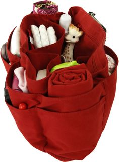 a red bag filled with baby items and the words removeable & washable baby bag inserts