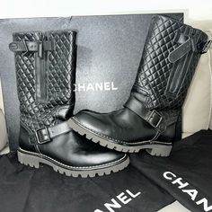 Chanel Tweed Leather Engineer Boots Black Cc Logo 7 37.5 Buckle Mid Calf Authenticated Size: 37.5 - A Us 7 Material: Leather & Tweed Condition: Excellent Wore Only Once. Great Pre-Loved Condition. Closure: Pull On, Buckle & Side Zip Toe Shape: Rounded Color: Black Tags: Women, Womens, Shoes, Low, Special Event, Day, Night, Classic, Ladies, Quiet Luxury, Staple, Spring, Summer, Fall, Winter, Cc, Interlocking, Casual, Chunky, Noir, Designer, Luxury, Authentic, Moto, Biker, Tall, Genuine, Monogram, 100, 100% Chanel Biker Boots, Designer Moto Boots With Buckle Closure For Fall, Designer Leather Moto Boots For Winter, Luxury Black Calf Leather Moto Boots, Designer Calf Leather Moto Boots With Round Toe, Designer Black Moto Boots With Buckle, Designer Black Moto Boots With Buckle Closure, Designer Black Moto Boots With Round Toe, Designer Black Moto Boots For Fall