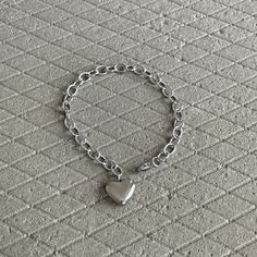 We love stainless steel jewelry! It can look sleek, punky and also lend itself to a hippyish aesthetic. ▪️▪️▪️PRODUCT Women Solid Heart Charm Cable Chain Bracelet Size 19cm Length (adjustable) 316L surgical stainless steel  Never Fade and Hypoallergenic Care instructions: avoid contact with liquids (water, perfume, beauty products) wipe dry with a soft cloth. VISIT STORE FOR MORE PRODUCT 🔗 https://www.etsy.com/ca/shop/TWISTEEL ▪️▪️▪️ S H I P P I N G   All orders will be shipped on the next business day UNITED STATES  - USPS First-Class Mail * 4 - 14 Business Days  Tracking & Insurance included CANADA - Canada Post * 4 - 14 Business Days Tracking & Insurance included EUROPE * 6 - 14 Business Days Tracking & Insurance included AUSTRALIA & ASIA  * 6 - 21 Business Days Tracking & Insurance in Trendy Stainless Steel Charm Bracelet, Silver Stainless Steel Heart Bracelet For Friendship, Trendy Everyday Stainless Steel Charm Bracelet, Minimalist Silver Heart Chain Bracelet, Minimalist Metal Bracelets For Valentine's Day, Minimalist Metal Bracelet For Valentine's Day, Everyday Metal Bracelets For Valentine's Day, Trendy Silver Heart Bracelet For Friendship, Stainless Steel Heart Charm Bracelet