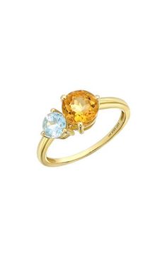 Two prong-set semiprecious stones bring vibrant sparkle to the center of this handcrafted 14-karat-gold ring and adds rich color to any stack. 1/2"W x 1/4"L setting Total stone weight: 1.43ct. 14k gold/blue topaz and peridot, blue topaz and citrine or blue topaz Imported Yellow Multi-stone Round Gemstones, Citrine Diamond Ring With Accent Stones In Yellow Gold, Yellow Gold Citrine Diamond Ring With Accent Stones, Gold Birthstone Ring With Topaz Gemstone, Gold Topaz Birthstone Ring With Gemstone, Yellow Diamond Ring In 14k Gold, 14k Gold Yellow Diamond Ring, Yellow 14k Gold Diamond Ring, Fine Jewelry 14k Gold Yellow Diamond Ring