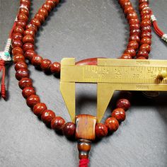 ❤This bodhi beads mala is made by Tibetan craftsmen and come from Hepo Town, Baiyu County, the birthplace of the famous Tibetan handicrafts,about 30 years old, hold and blessed by a lama in Baiyu Monastery.It is composed of 108 bodhi seed beads, and is equipped with 3 agate beads, silver bead counters are installed on both sides, 1 mani jewel bead clip,and finally consists a bone guru bead and vajra on the end, very elegant.❤Details1. Handmade 108 bodhi beads approximately 8mm,mala's perimeter i Pumpkin Bead, Beads Mala, 30 Years Old, Silver Bead, Mala Beads, Prayer Beads, Agate Beads, Silver Beads, 30 Years