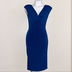 Gorgeous Navy Blue Fitted Dress Knee Length Never Worn Armpit To Armpit - 16 Inches Waist - 15 Inches Length - 41 Inches Blue Stretch Lined Dress, Blue Stretch Sheath Midi Dress, Blue Stretch Midi Dress For Formal Occasions, Elegant Blue Lined Midi Dress, Navy Blue Fitted Dress, Blue Fitted Dress, Dress Knee Length, Navy Blue Dress, Dressy Dresses