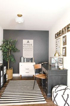 a living room filled with furniture and a potted plant