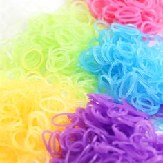 many different colored rubber bands are arranged together