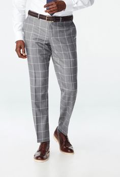 Imbued with a heavy set, twill-woven windowpane, the Durham line echoes the traditional checked pattern that first put this popular design on the sartorial map. Yet with its thick lines and bold, contrasting colors, this fabric is in a league all its own. Grey Checkered Pants Outfit Men, Classic Houndstooth Formal Pants, Elegant Houndstooth Pattern Pants, Men’s Plaid Dress Pants Outfits, Mens Gray Plaid Pants, Check Fabric, Navy Pants, Grey Pattern, Grey Pants