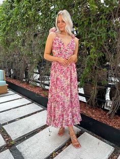 Summer Dress: Needing a gorgeous, floral print dress for a summer wedding? Our Capri Maxi Dress is a pink, and yellow floral dress with a v-neckline, ruffle straps, and a self tie, corset back! Wear her for any formal occasion! Floral Maxi Dress Outfit, Maxi Dress Outfit Summer, Tie Corset, Wedding Guest Accessories, Pink Floral Maxi Dress, Maxi Dress Outfit, Yellow Floral Dress, Corset Back, Bold Jewelry