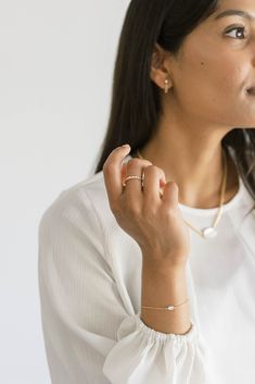 This sleek gold chain bracelet with a graceful oval-shaped mother of pearl centerpiece complements all styles. This sweet bracelet is perfect for mixing in a stack or wearing solo for a minimal look. Made with recycled metals, for the earth friendly at heart. Recycled 14k gold filled Available in 6.5" or 7.5" lengths Both lengths include a 1/2" long extender chain Mother of Pearl is 4mm x 6mm Oval Bracelet With Adjustable Chain For Everyday, Oval Adjustable Chain Bracelet For Everyday, Everyday Oval Chain Bracelet With Adjustable Chain, Everyday Oval Adjustable Chain Bracelet, Classic Pearl Bracelet With Adjustable Chain For Everyday, Elegant Oval Chain Bracelet For Everyday, Elegant Oval Bracelets For Everyday, Minimalist Oval Bracelets For Everyday Wear, Classic Everyday Pearl Bracelet With Adjustable Chain