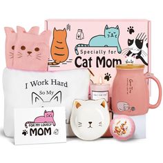 the cat mom gift set includes a pink mug, coffee cup and other items