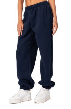 An oversized fit and handy pockets bring trendy comfort to these cotton-blend sweatpants that you'll love for your off-duty look. 50% cotton, 50% polyester Machine wash, dry flat Imported Blue Sweatpants Outfit, Navy Blue Sweatpants Outfit, Sweatpants Oversized, Navy Blue Sweatpants, Oversized Sweatpants, Visionary Fashion, Cute Nike Outfits, Blue Sweatpants, Sweatpants Outfit