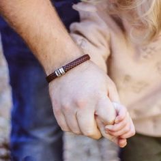 Looking for a unique and thoughtful gift for someone special? Look no further than Belle Fever Personalised Brown Leather Bracelet! Crafted from high-quality, hypoallergenic materials and handcrafted in-house, this bracelet is both durable and comfortable to wear, making it the perfect accessory for any occasion.The bracelet features a thick brown leather band that is solid and thick, giving it a premium feel. The steel plate on the bracelet can be inscribed with a name, date, or symbol of your Brown Braided Bangle Bracelets As Gift, Brown Braided Bangle Bracelet For Gift, Brown Braided Bracelet For Gifts, Brown Leather Bangle Bracelet As A Gift, Brown Leather Bangle Bracelet Gift, Brown Braided Bracelet For Gift, Handmade Brown Wristband Gift, Minimalist Bracelet With Stainless Steel Clasp For Gift, Minimalist Leather Bracelet With Stainless Steel Clasp