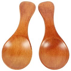 two wooden spoons sitting next to each other