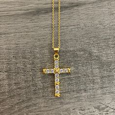 -Gold plated necklace. -Pendant measurement: 2.5cm long, 2cm wide -Chain measurement: 1mm thickness, 20” long + 2” extensor. Metal Clavicle Chain Necklace With Cross Pendant, Spiritual Clavicle Chain Cross Pendant Necklace, Adjustable Gold Plated Cross Pendant Necklace, Gold Cross Jewelry With Large Pendant, Gold Plated Cross Pendant Necklace With Adjustable Chain, Gold Plated Chain Necklace With Cross Pendant, Gold Plated Pendant Cross Necklace, Metal Cross Pendant Necklace With Adjustable Chain, Gold Metal Cross Necklace With Clavicle Chain