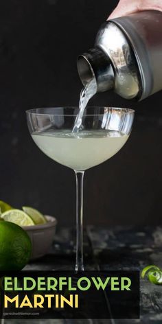 someone pouring a drink into a martini glass with limes in the background and text that reads elderflower martini