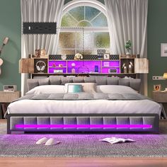 a bed with purple lights underneath it in a room next to a desk and guitar