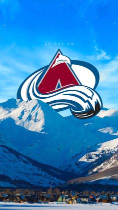 the colorado avalanche logo is seen in front of snowy mountains