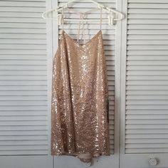 Fully Lined Spaghetti Strap Gold Sequined Babydoll Dress In Size S. Brand New With All Tags. Measures 17 Inches Flat At The Underarms, And The Top Seam Across The Back Has Elastic With A Few Inches Of Stretch. It Is 22 Inches Long At The Side Seams And 26 Inches Long From Where The Straps Connect In The Front. Could Also Be Worn As A Tunic. Mini Babydoll Dress, Dresses Gold, Sequin Mini, Gold Sequin, Gold Dress, Babydoll Dress, Baby Dolls, Spaghetti Strap, Sequin