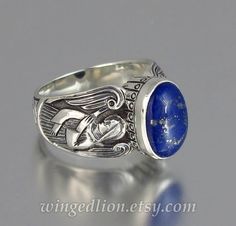 GUARDIAN ANGELS lapis lazuli ring Sterling Silver Winged Rings In Silver, Spiritual Winged Sterling Silver Jewelry, Elegant Sterling Silver Winged Rings, Mens Silver Ring, Winged Lion, Lion Jewelry, Two Angels, Deep Royal Blue, Lapis Lazuli Ring