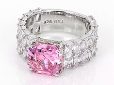 Bella Luce® pink and white diamond simulants 19.48ctw square, rectangle, and round, rhodium over sterling silver ring. Measure approximately 0.88" L x 0.38" W and is not sizeable. The diamond equivalent weight is 11.80ctw. Pink Cushion Cut Diamond Jewelry, Pink Cushion Cut Jewelry With Prong Setting, Cushion Cut Pink Cubic Zirconia Jewelry, Pink Cushion Cut Cubic Zirconia Jewelry, Asscher Cut Diamond Jewelry In Pink, Pink Cushion Cut Jewelry Gift, Pink Square Cut Jewelry For Wedding, Luxury Rectangular Pink Rings, Pink Asscher Cut Diamond Jewelry