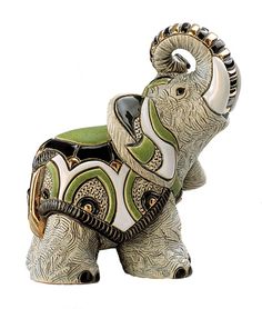 an elephant figurine with decorative designs on it's body