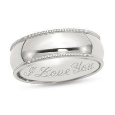 a white gold wedding ring with the words i love you engraved on it's side