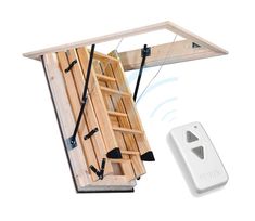 a remote control is attached to the inside of a wooden structure with ladders on it