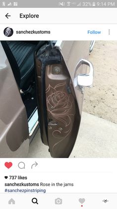 an image of someone's car door with graffiti on it