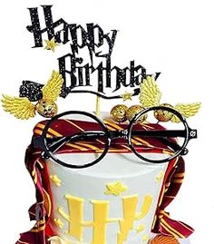 a harry potter birthday cake with glasses on top