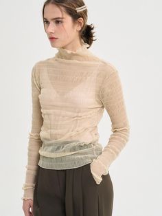 Composition : Nylon 95% Span 5%Country of Origin : Republic of Korea Chic Polyamide Tops For Spring, Sheer Beige Stretch Top, Stretch Sheer Beige Tops, Beige Sheer Stretch Top, Stretch Beige Sheer Top, Elegant Spring Polyamide Tops, Sheer Beige Tops For Spring, Turtle Neck Top, Turtle Neck