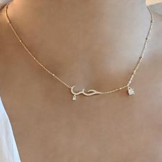 This Arabic Love Necklace features the word for 'love' in Arabic which translates to Hubb حب. It features a dainty gold chain with high quality square cubic zirconia crystals. Pair this up with our matching Arabic Love Bracelet for a complete look. We make our jewellery in small batches to reduce wastage. Our jewellery is designed with the modern Woman in mind, elegant, unique pieces with a classic touch. This is our most popular necklace and is great for gifting, whether it's Valentines, Mothers Day, Birthday Christmas or simply a gift for a friend, sister etc. 14ct gold plating on 925 sterling silver 35+10 CM Meaningful Christmas Gifts, Dainty Gold Chain, Gold Necklace For Women, Meaningful Christmas, Popular Necklaces, Jewelry Elegant, Dainty Gold Necklace, Love Bracelet, Gold Necklace Women