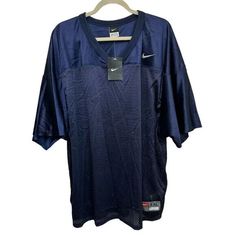 Nike Team 2XL Blank Football Jersey Blue Penn State PSU NWT Retro 535528-419 Size: XXL 29.5" Armpit to armpit 12" Sleeves 31" Long New with tags Casual Navy Sports Shirt, Navy Casual Sports Shirt, Casual Navy Shirt For Sports, Navy Long Sleeve Summer T-shirt, Nike Navy Sports Tops, Nike Sporty Navy Top, Sporty Navy Nike Top, Nike Casual V-neck Top, Blue V-neck Shirt With Relaxed Fit