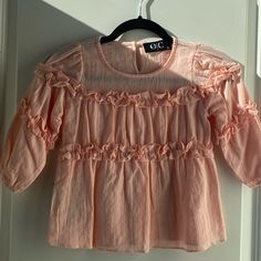 New Osmond & Co, Girls Size: Small, Medium, X- Large Color: Peach Tags Attached, Peach Ruffle Textured Shirt 3 Available Boys Christmas Shirt, Textured Shirt, Baseball Girls, Long Sleeve Kids, Xl Girls, Holiday Shirts, Baby Shirts, Ruffle Top, Striped Tee