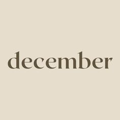 the word december written in brown on a beige background