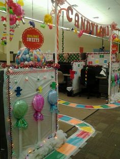 an office decorated for christmas with candy land decorations