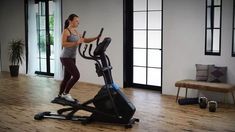 woman pedaling on horizon EX-59 Elliptical Elliptical Trainer, Nautilus, Always Be, Money