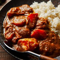 a close up of a plate of food with rice