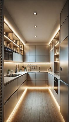 a kitchen that has some lights on the side of it and cabinets in front of it