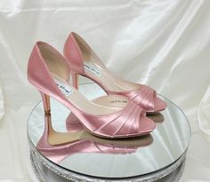 "Dusty Rose Wedding Shoes are perfect shoes for the bride or the bridesmaids.  The comfortable 3 inch shoes in the listing (also available in 2 heel) have been dyed Dusty Rose, but is also available in over 100 different colors as well as the option of sending us a sample to color match for you!  If you chose a different color from my chart or a designer color, please leave the name of the color you would like in the note to seller portion of checkout. If you would like a different heel size, pl Pink Bridal Heels, Pink Bridesmaid Shoes, Jem Costume, Shoes For The Bride, Dusty Rose Bridesmaid, Bride Heels, Fancy Heels, How To Dye Shoes, Dusty Rose Wedding