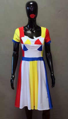 a female mannequin wearing a colorful dress