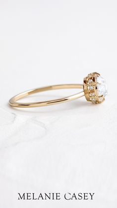 Our Rose Basket Ring has the vintage appeal of a rose cut diamond focal, set on a dainty 14k gold band with a hidden halo of diamonds around the setting. This unique engagement ring can be made in yellow, rose, white gold or platinum - see more at melaniecasey.com! Bezel Engagement Rings, Rose Cut Engagement Ring, Rose Basket, Rose Cut Diamond Ring, Handcrafted Engagement Ring, Melanie Casey, Dainty Gold Bracelet, Bezel Engagement Ring, Rosecut Diamond Ring