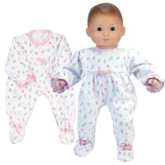 a baby doll is standing next to an infant doll wearing pajamas and holding hands out