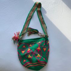 Handwoven Bag From Colombia, New Never Used Casual Woven Hobo Bag In Pouch Shape, Casual Woven Hobo Pouch Bag, Casual Woven Crossbody Hobo Bag, Green Pouch Bucket Bag For Summer, Green Bucket Satchel, Trendy Woven Pouch Bag, Pink Woven Crossbody Shoulder Bag, Green Hobo Bag With Adjustable Strap And Double Handle, Green Pouch Shoulder Bag With Adjustable Strap