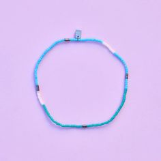 Dive into the beauty of the ocean with our Seafoam Dream Stretch Anklet – the ultimate summer accessory! Inspired by the serene hues of the sea, this anklet features a mesmerizing blend of light blues and teals, reminiscent of tranquil ocean waves. String on durable nylon cord that adjusts and stretches to any size Length of anklet is 9" Because jewelry products are handcrafted by artisans, dimensions may vary from piece to piece Blue Beaded Ocean-inspired Anklet, Tiny Beads Bracelets For Summer Beach, Summer Beach Bracelets With Tiny Beads, Blue Beaded Necklaces For Beach In Summer, Ocean-inspired Blue Beaded Anklet, Ocean-inspired Beaded Anklets For Summer, Summer Ocean-inspired Beaded Anklets, Light Blue Bohemian Bracelet For Summer, Light Blue Bracelets For Summer Gifts