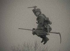 two people are in the air with skis and poles attached to their backs as they jump through the snow