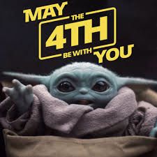 a baby yoda in a blanket with the words may the 4th be with you