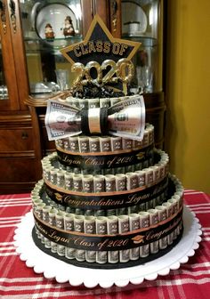 a cake made out of stacks of money on top of a table