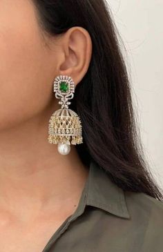 Gorgeous CZ Jhumka earrings with Emerald green stones and AAA quality CZ Korean stones  Lightweight and elegant Can be pad with any dress Length approx 2 inches Closure  Push back Please let me know if you have any questions Customized orders takes 3 to 4 weeks, depending on piece requirements. The Ombre Designs Jewelry pieces can be customized in accordance with your requirement. Please Email or Whats app on : +91 8448833193 / sonalikamehra [!at] theombredesigns.com Diamond Jhumkas, Pakistani Earrings, Emerald Green Stone, Jewelry Pakistani, Green Stones, Earrings Diamond, Jhumka Earrings, Whats App, Green Diamond