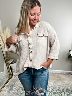 Shackets are a classic staple, and we love the cozy waffle knit texture that sets this one apart! A versatile layering piece that can be styled so many ways - our "Talulah" Acid Wash Shacket is an instant "ADD TO CART!"Button it up to wear as an oversized shirt, or leave it open for layering over a basic top or statement graphic tee!- High-low hem- Front button closure- Functional pocketsFits oversized; Bethany is 5'4" 175lb and wearing a L/XL in photosPaired with our Raelynn Slim Straight Jeans Everyday Soft Knit Button-up Outerwear, Collared Waffle Knit Tops For Fall, Fall Collared Waffle Knit Tops, Fall Waffle Knit Collared Top, Fall Tops With Buttoned Pockets For Everyday, Textured Knit Long Sleeve Outerwear With Relaxed Fit, Fall Outerwear For Layering With Waffle Knit, Everyday Button-up Sweater, Fall Waffle Knit Button-up Tops