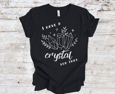 For anyone who loves crystals, gemstones, and healing energies. Wear this tee at home meditating or out and about while you peruse the rock shops.  Made with 100% soft cotton this shirt is so comfy! The fit is true to size and I will never charge more for plus sized shirts. Each shirt is made to order with a high quality print with durable inks. SHIPPING & PRODUCTION :: Always enjoy free shipping with The Feral Fern! :: Products will be received within 5-10 business days :: If there are any issu Moon Phases Shirt, Love Crystals, Holiday Cards Handmade, Spiritual Shirts, Positive Gift, Hippie Shirt, Plus Sized, Boho Shirts, Bff Gifts